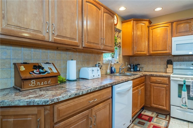 kitchen with sink, light stone counters, white appliances, decorative backsplash, and light tile patterned floors