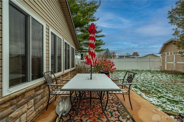 view of snow covered patio