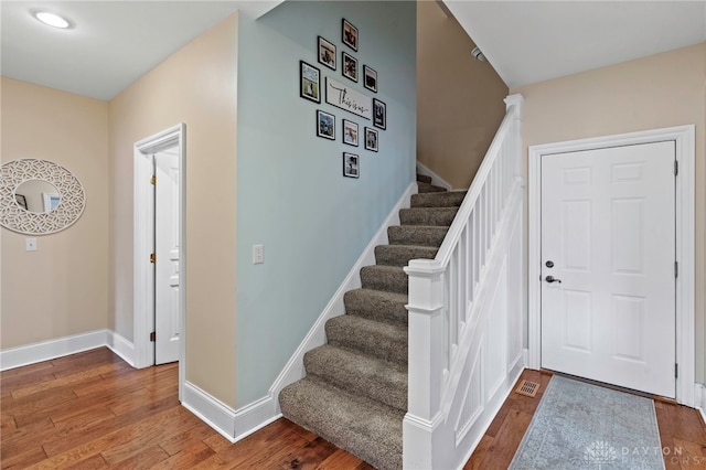 foyer with hardwood / wood-style floors