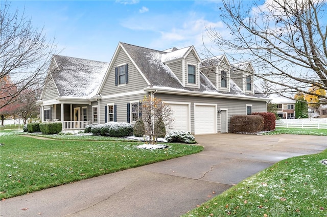 view of property exterior with a lawn, a porch, and a garage