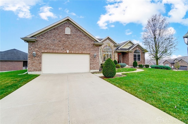 view of front of house with a front lawn and a garage