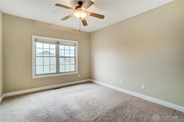 carpeted empty room with ceiling fan