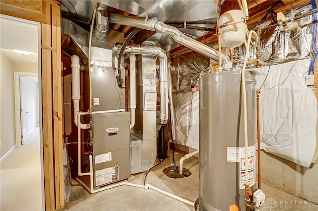 utility room featuring heating unit and water heater