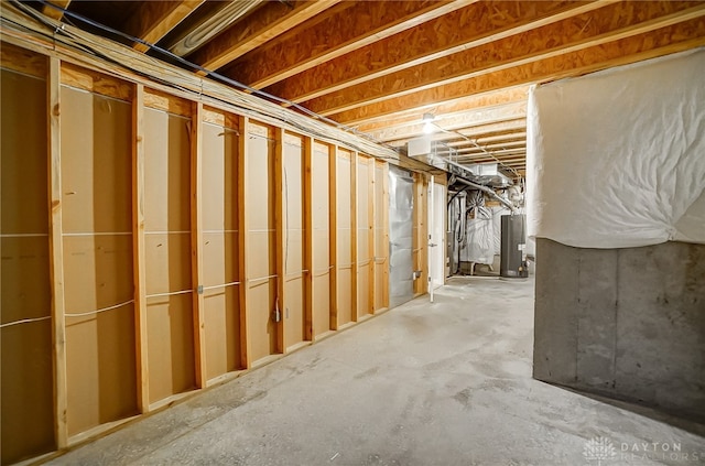 basement featuring gas water heater