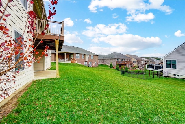 view of yard with a wooden deck