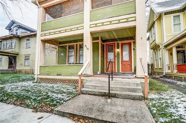 property entrance with a balcony