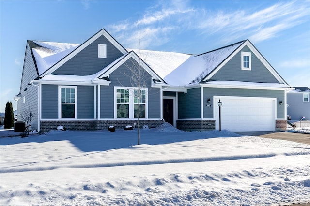 view of front of house featuring cooling unit and a garage