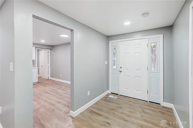 foyer entrance featuring light hardwood / wood-style flooring