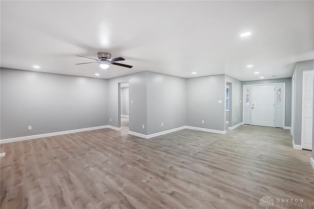 interior space featuring ceiling fan and light hardwood / wood-style flooring