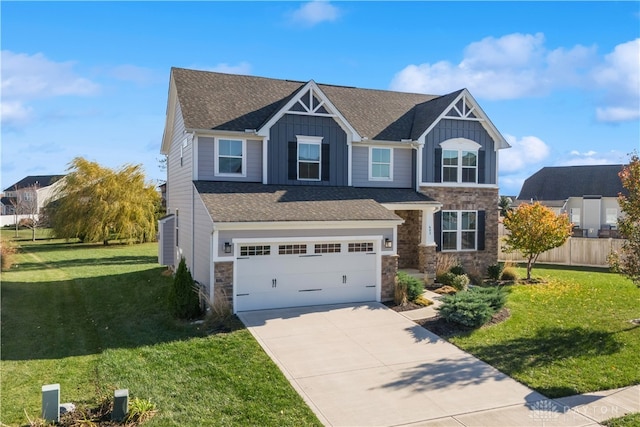 view of front facade featuring a garage and a front lawn