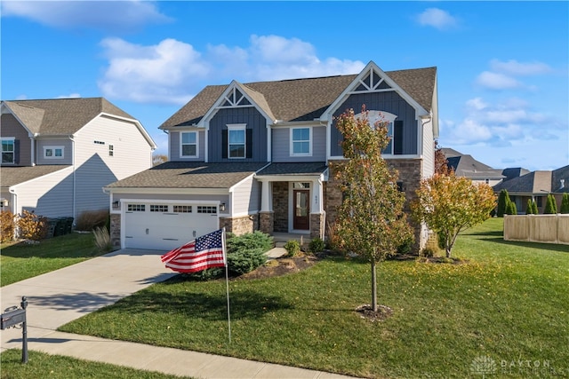 craftsman house with a garage and a front yard