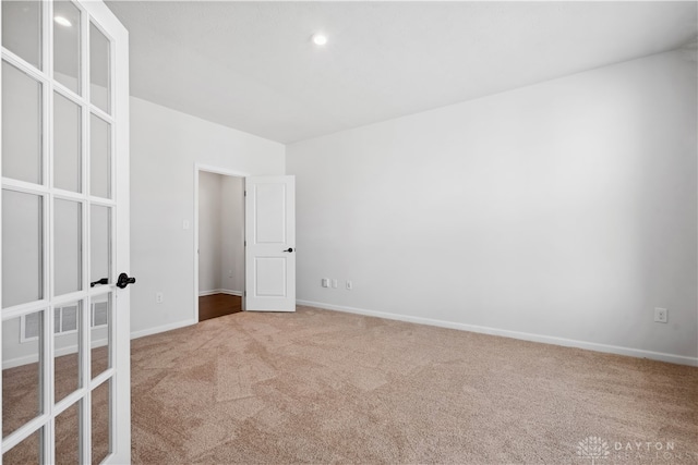 view of carpeted spare room