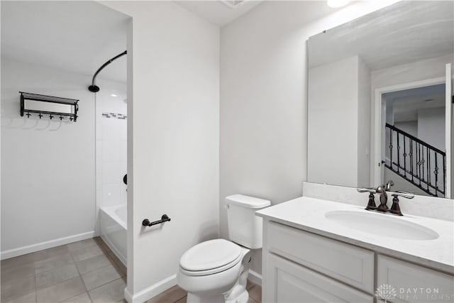 full bathroom featuring tile patterned flooring, vanity, shower / bathtub combination, and toilet