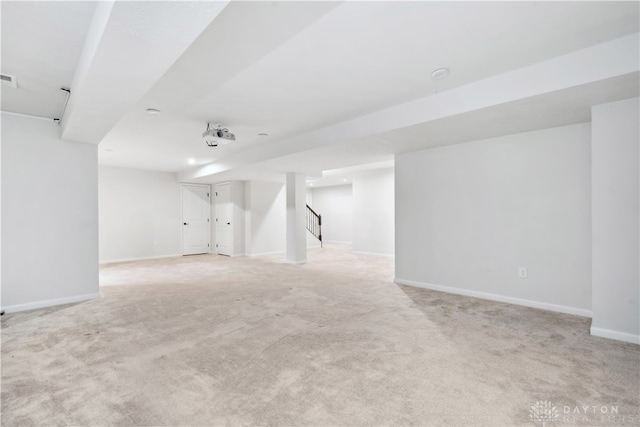 basement with light carpet