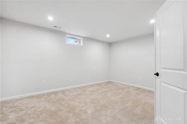 basement with light carpet