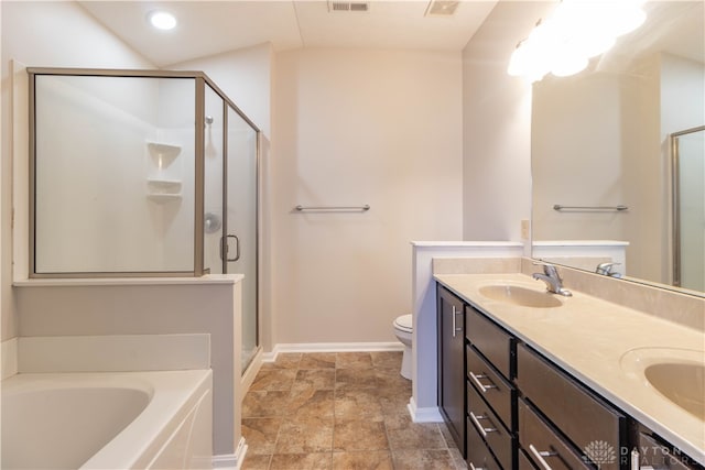 full bathroom with vanity, toilet, and independent shower and bath