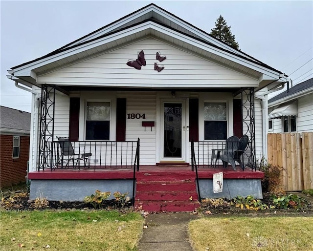 bungalow-style house featuring covered porch