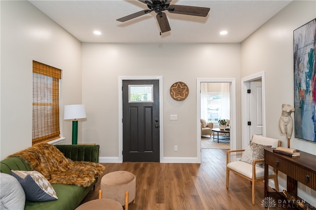 entryway featuring ceiling fan and wood-type flooring