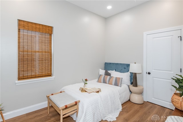 bedroom featuring light hardwood / wood-style flooring