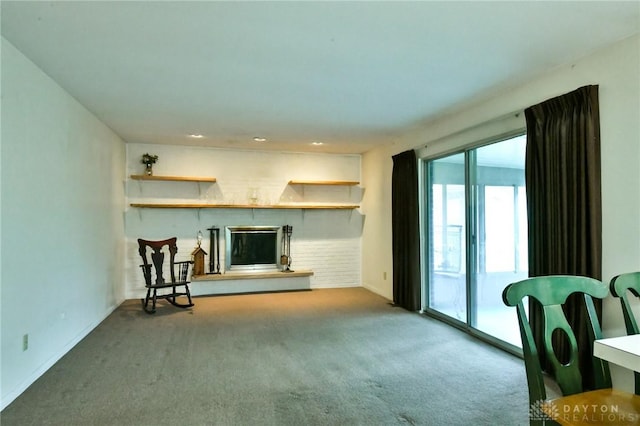 5331 Birchbend Ct, Dayton, OH 45415 - carpeted living area with a fireplace with raised hearth and baseboards
