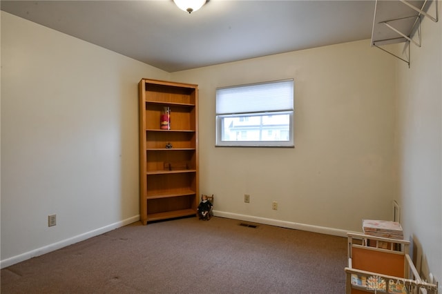 unfurnished room with carpet flooring