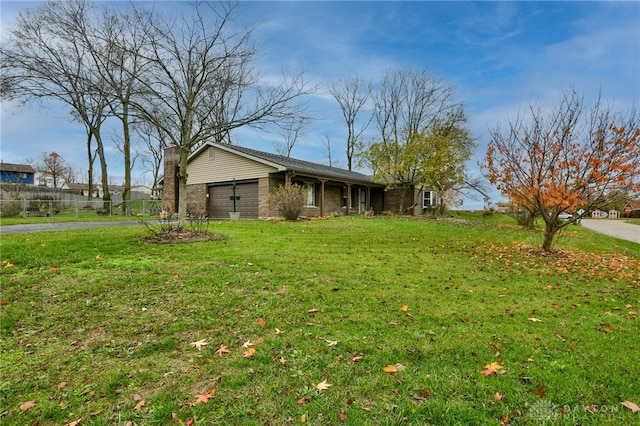 view of yard featuring a garage