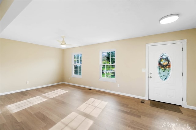 entryway featuring ceiling fan and light hardwood / wood-style floors