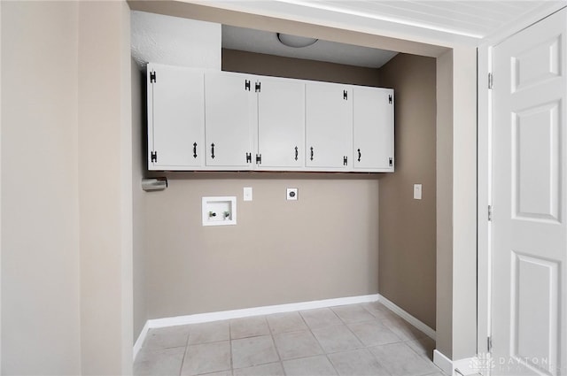 laundry area with cabinets, light tile patterned floors, hookup for an electric dryer, and washer hookup