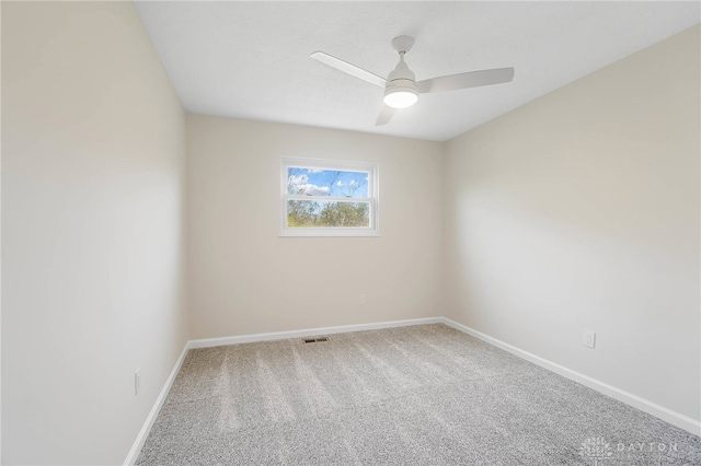 unfurnished room featuring carpet and ceiling fan