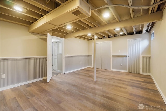 basement with wood-type flooring