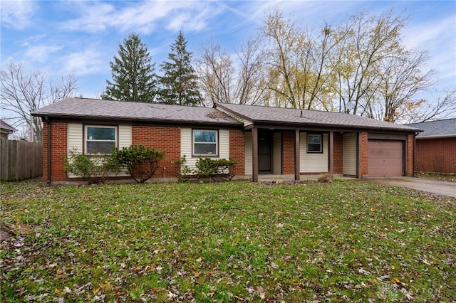 single story home featuring a front yard and a garage