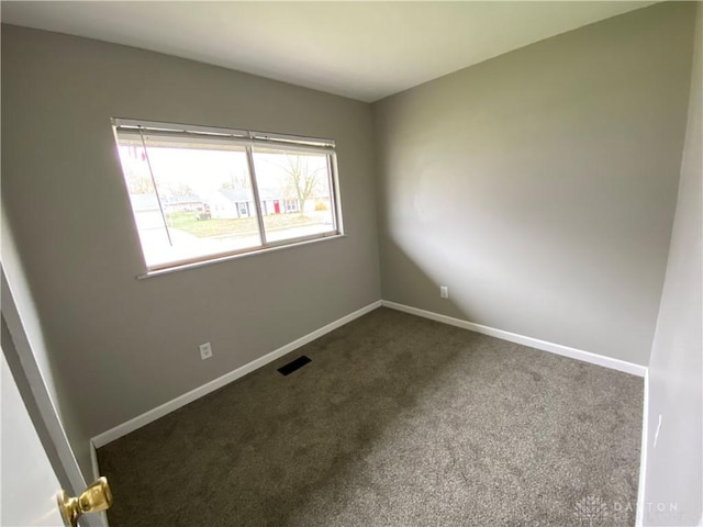 view of carpeted spare room