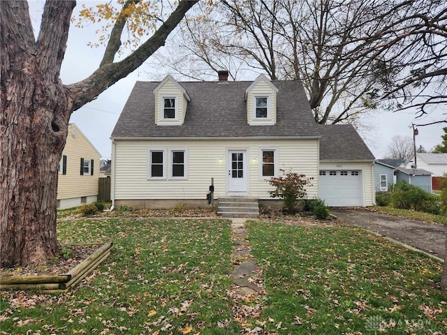 cape cod house with a garage and a front yard