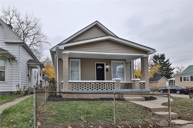 bungalow featuring covered porch