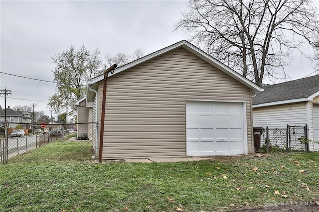 garage with a lawn