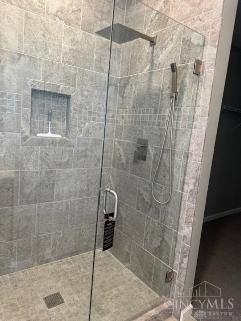 bathroom featuring an enclosed shower