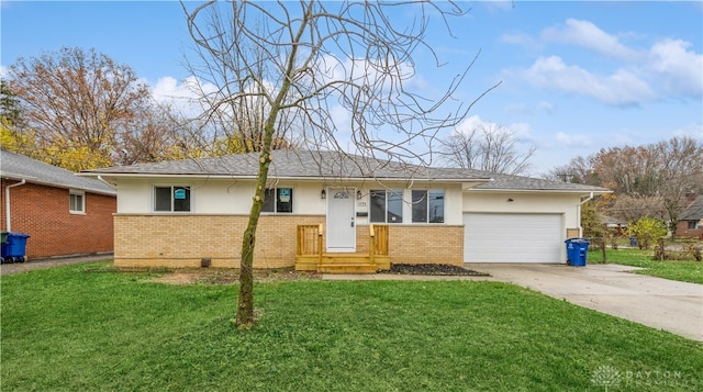 single story home featuring a front yard and a garage