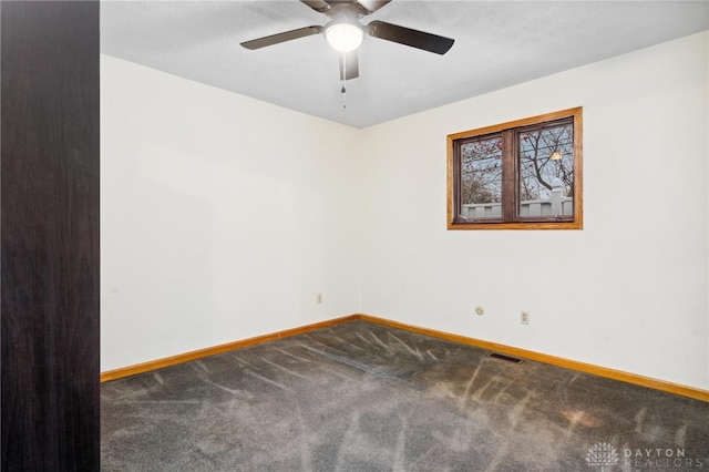 carpeted empty room with ceiling fan