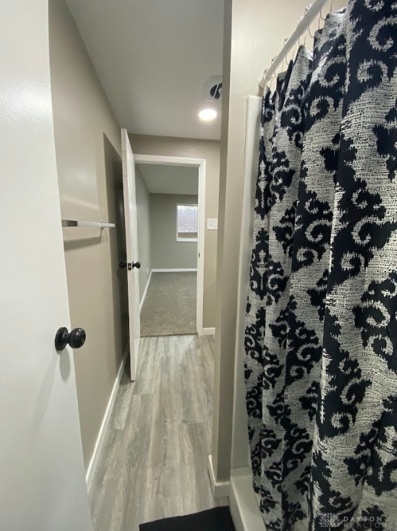 bathroom featuring hardwood / wood-style flooring