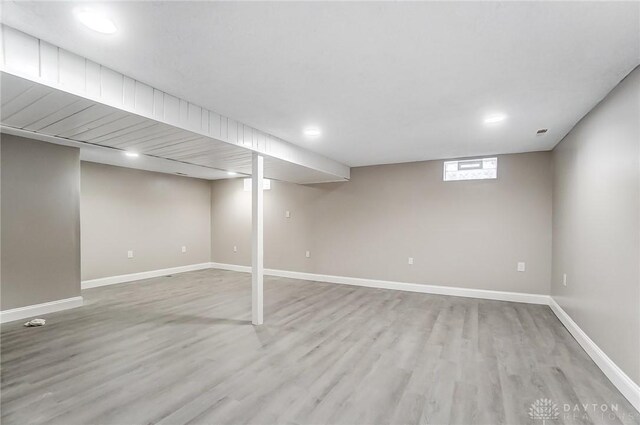 basement with light wood-type flooring