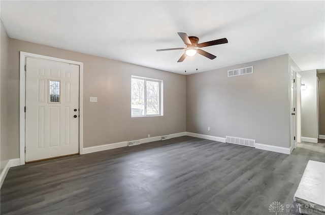 entryway with ceiling fan and dark hardwood / wood-style floors