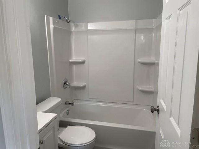 full bathroom featuring vanity, shower / tub combination, and toilet