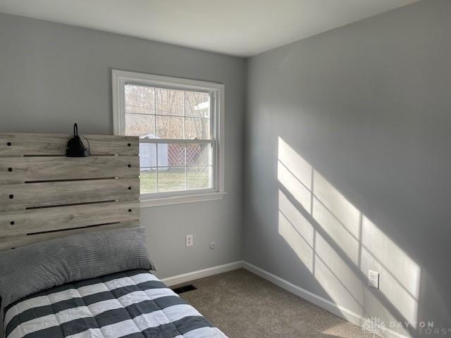 bedroom featuring carpet