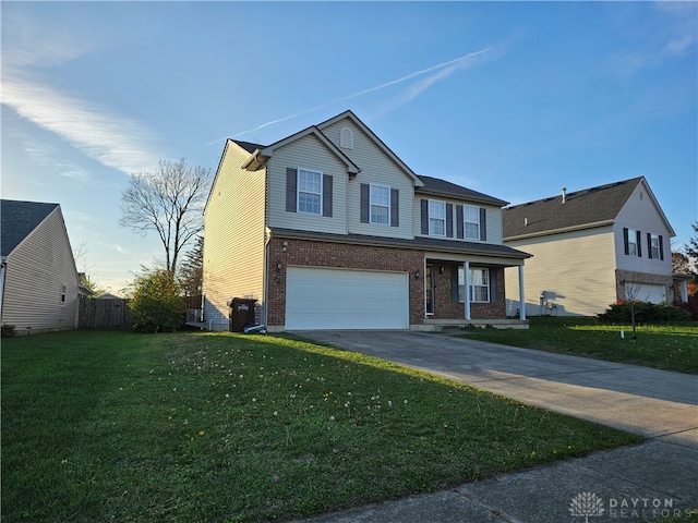 front facade with a garage and a front yard