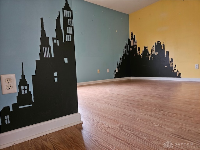 empty room featuring wood-type flooring