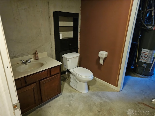 bathroom featuring vanity, concrete floors, water heater, and toilet