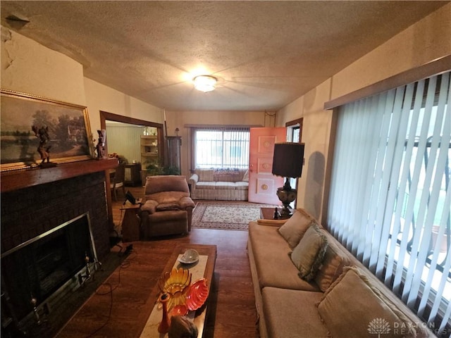 living room with a textured ceiling