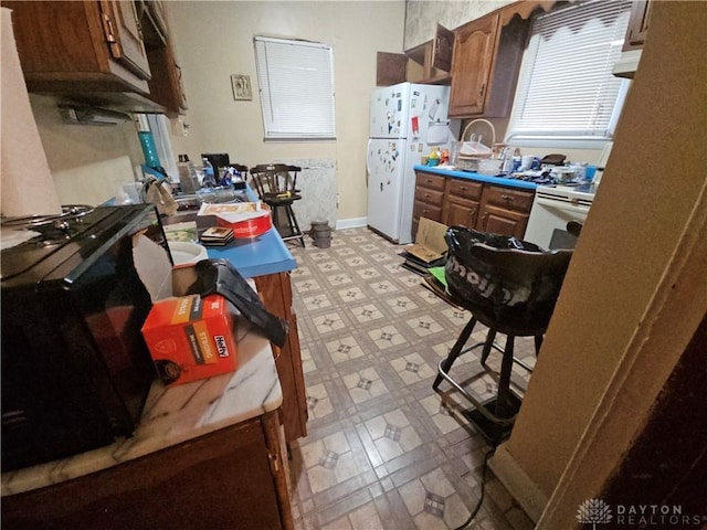 kitchen featuring white appliances