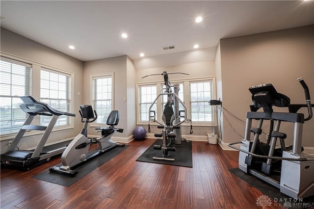 workout area with dark hardwood / wood-style flooring