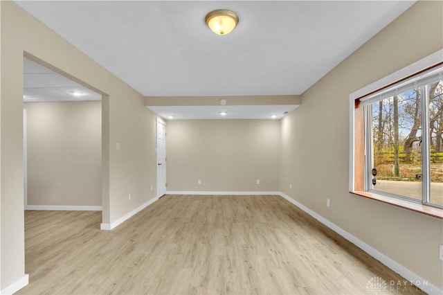 empty room with light wood-type flooring